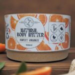Natural Sweet Orange Body Butter in eco-friendly packaging for soft hydrated skin